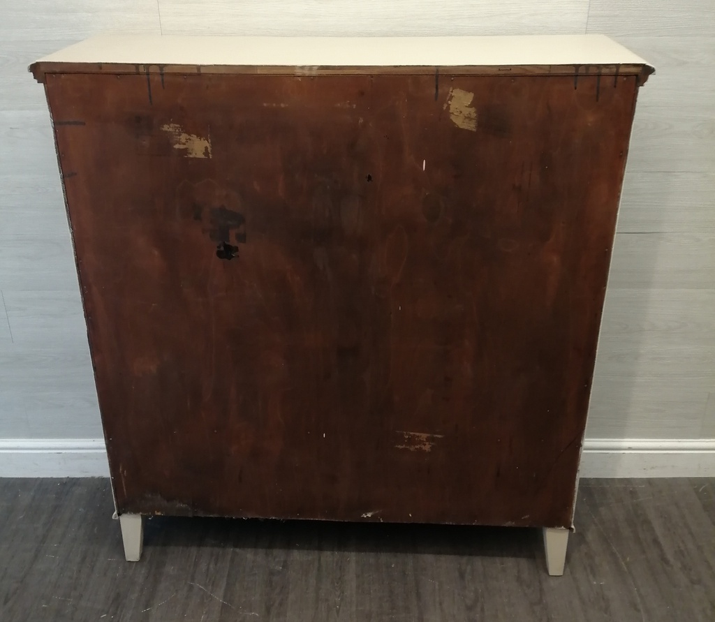 Glazed front sliding door painted bookcase