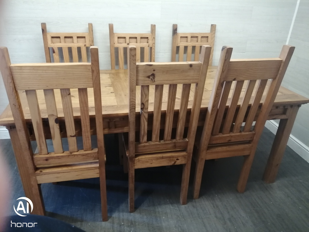 Lovely rustic pine table and six chairs