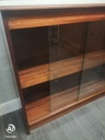 Glazed front sliding door neat bookcase