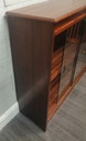 Glazed front sliding door neat bookcase