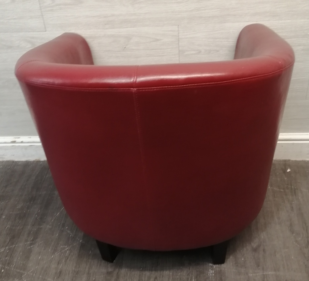 Red faux leather tub chair
