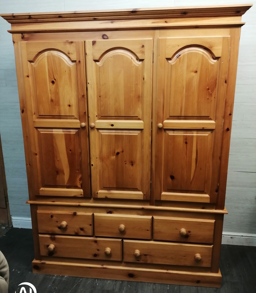 Quality triple size solid pine wardrobe with bank of drawers