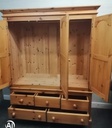 Quality triple size solid pine wardrobe with bank of drawers