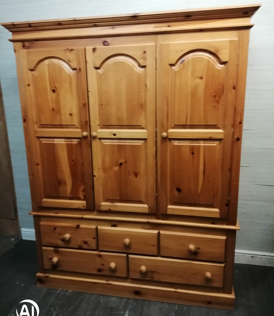 Quality triple size solid pine wardrobe with bank of drawers