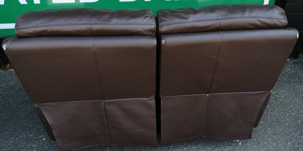 Two seater brown leather recliner sofa