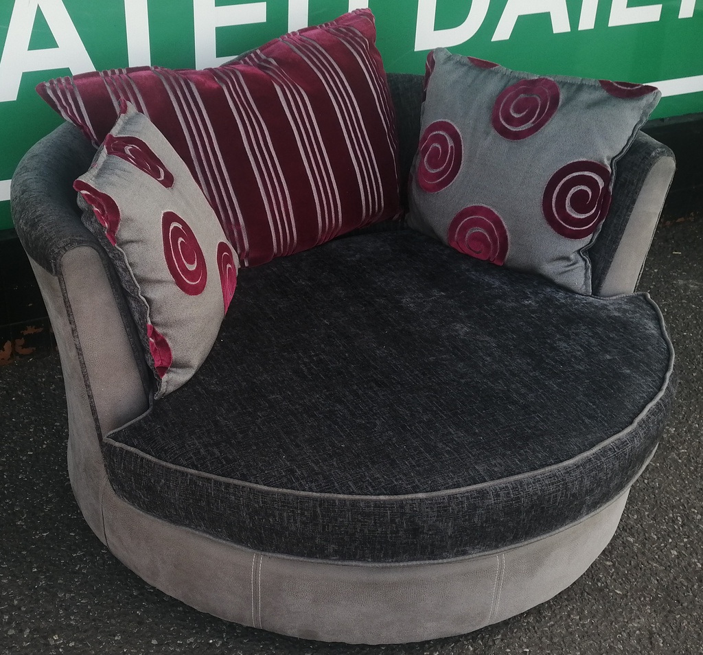 Grey Toned DFS Cuddle Swivel Chair