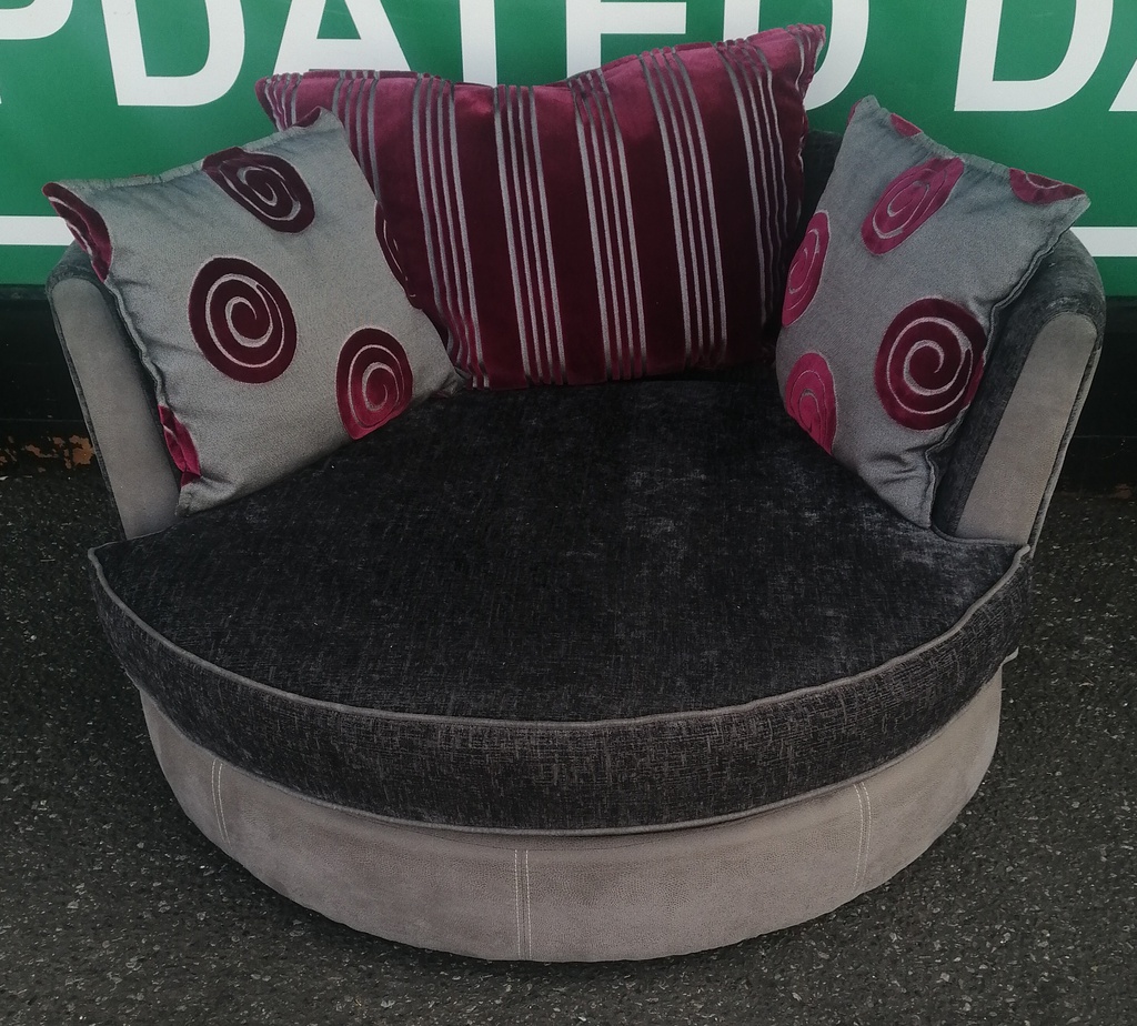 Grey Toned DFS Cuddle Swivel Chair