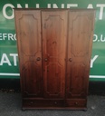 Triple size solid dark pine wardrobe with drawers