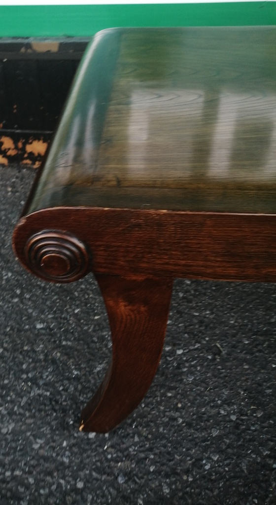Dark wood scrolled coffee table