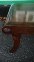Dark wood scrolled coffee table
