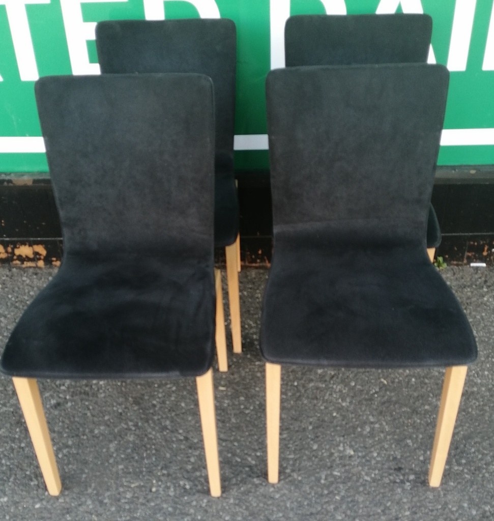Set of four ligne roset black dining chairs