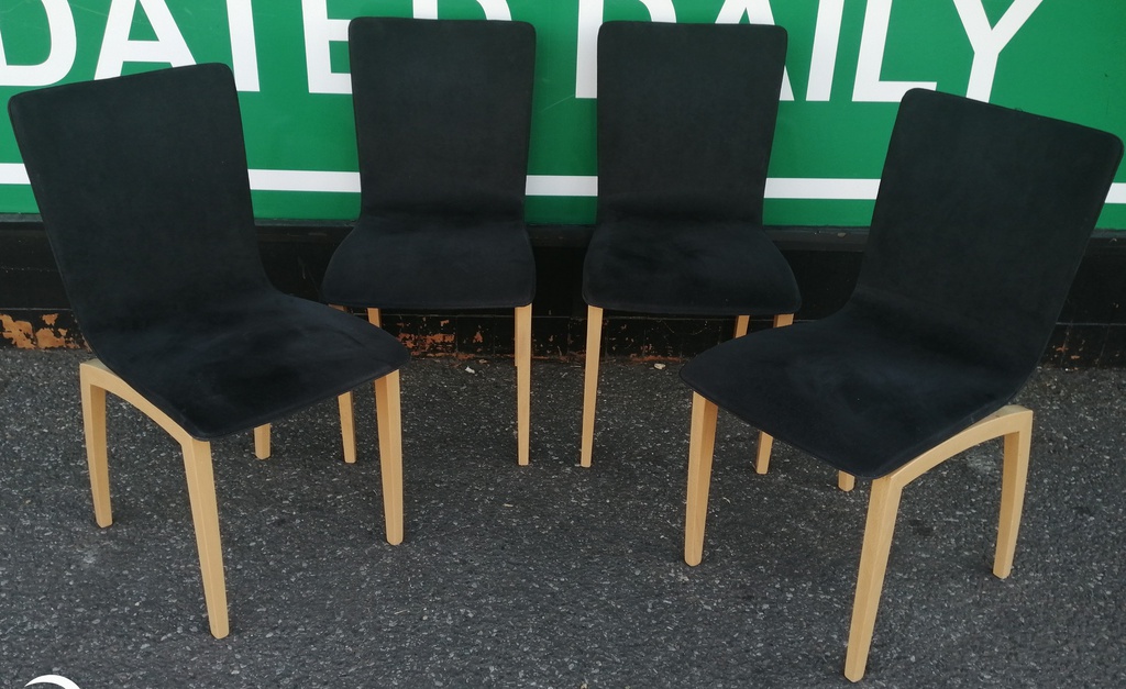 Set of four ligne roset black dining chairs