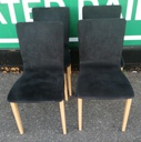 Set of four ligne roset black dining chairs