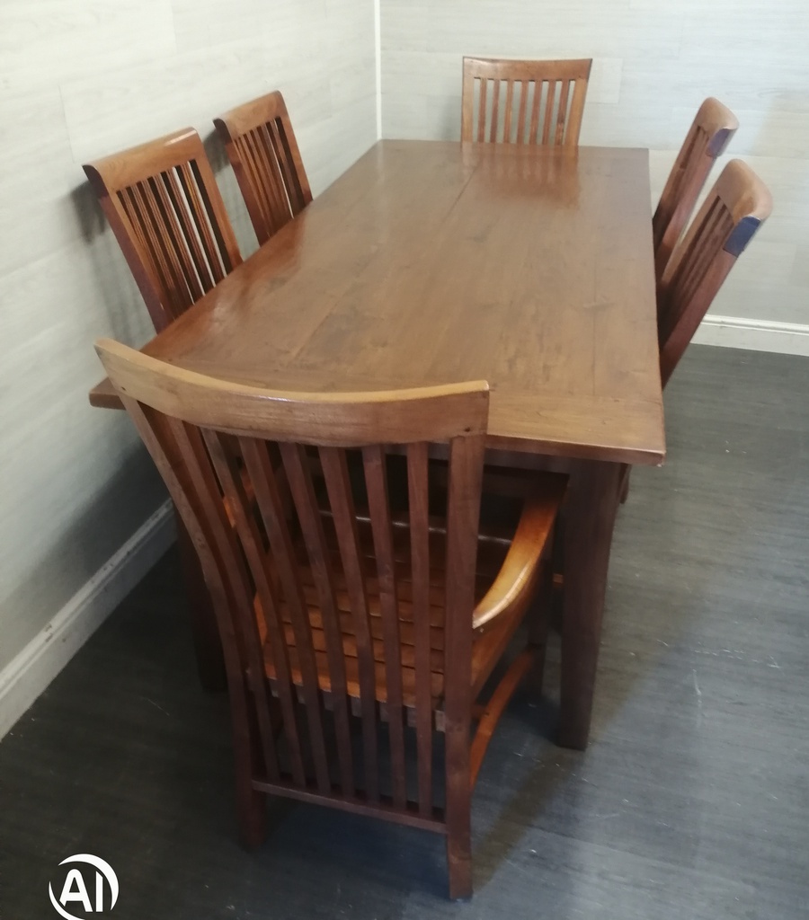 Lovely rustic dark wood table and six chairs