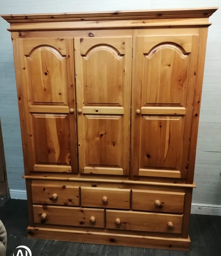 Quality triple size solid pine wardrobe with bank of drawers