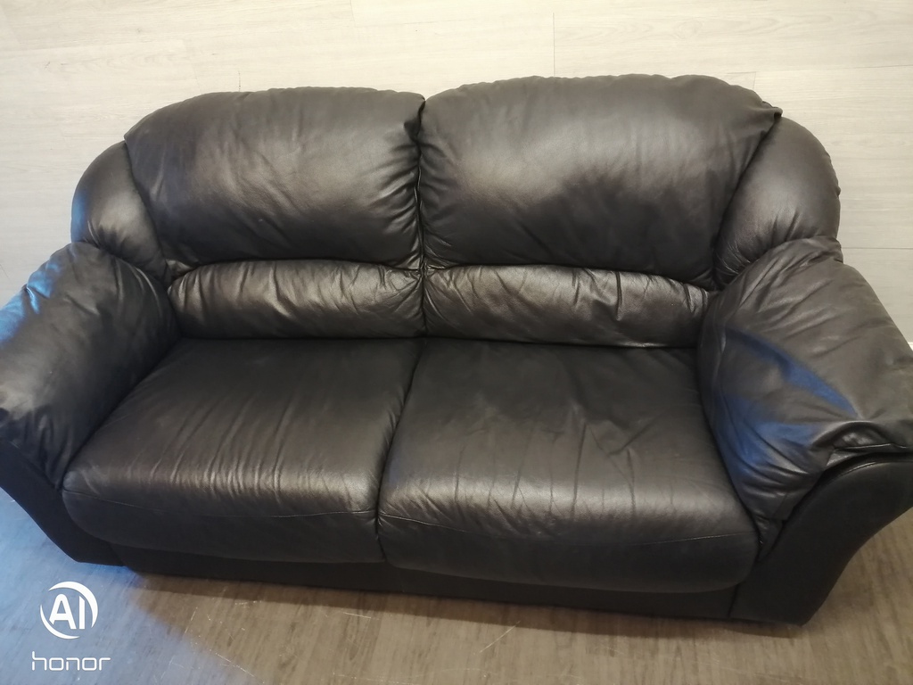 black leather two seater sofa