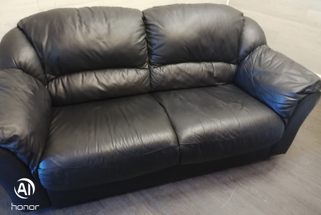 black leather two seater sofa