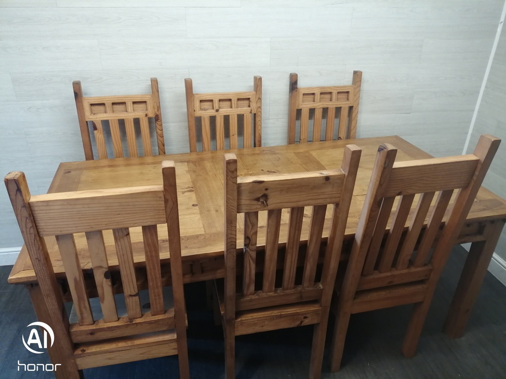Lovely rustic pine table and six chairs