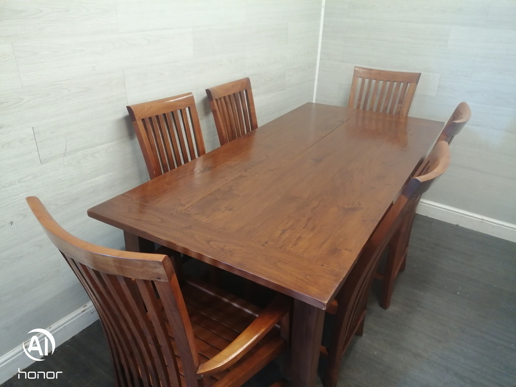 Lovely rustic dark wood table and six chairs