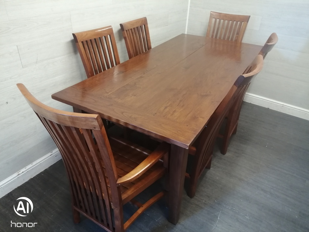 Lovely rustic dark wood table and six chairs