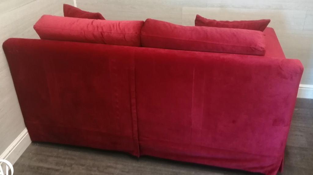 Lovely  cranberry red two seater sofa