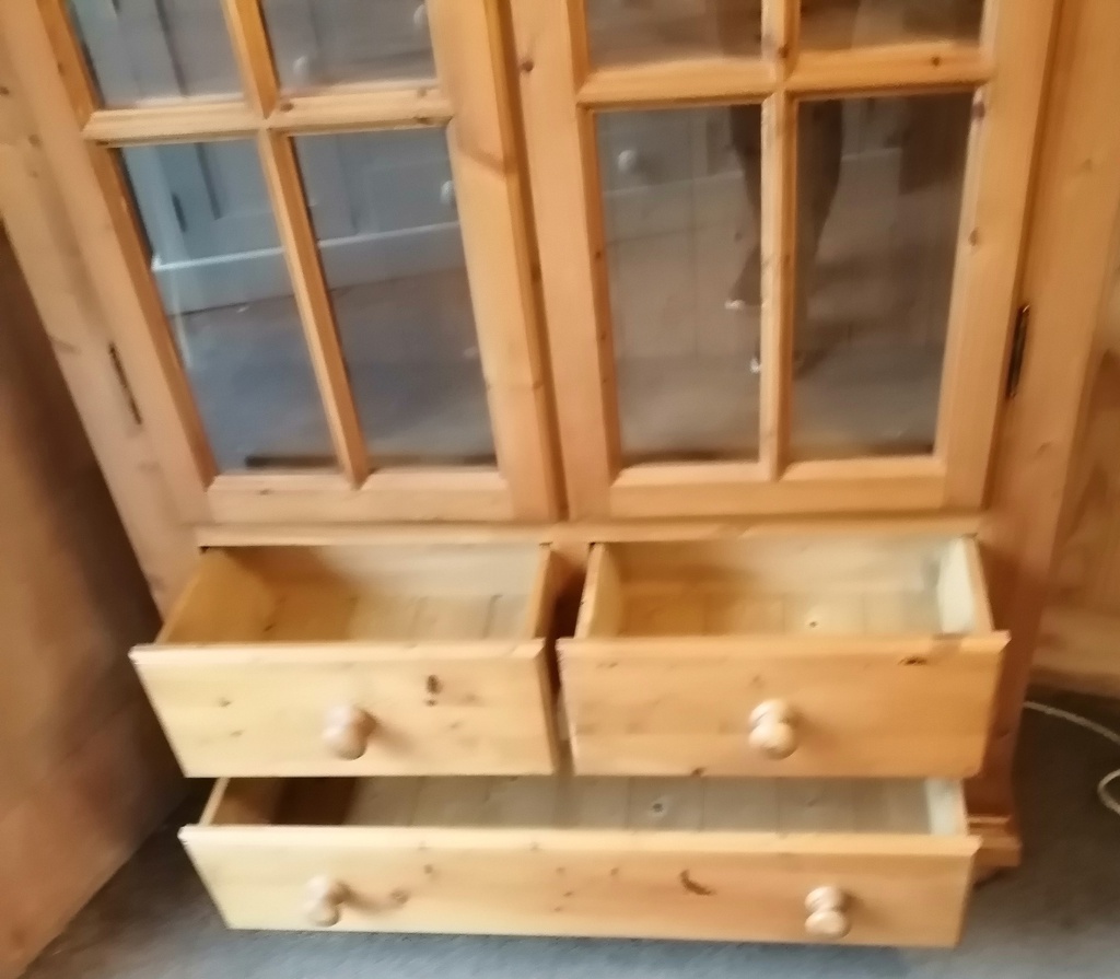 Solid pine glazed  display unit with drawers