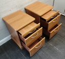 Pair of bedside chests with tea tray