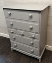GREY STAG SEVEN DRAWER CHEST
