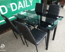 BLACK GLASS TABLE AND 4 CHAIRS