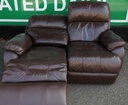 Two seater brown leather recliner sofa
