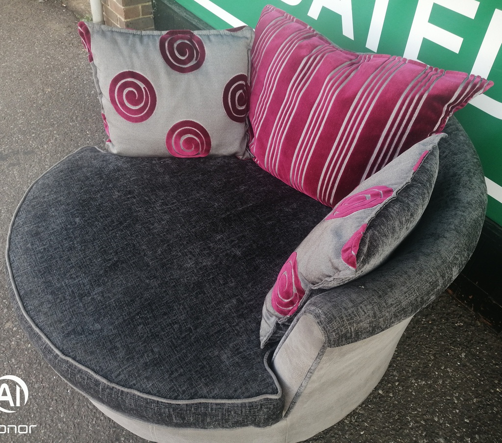 Grey Toned DFS Cuddle Swivel Chair