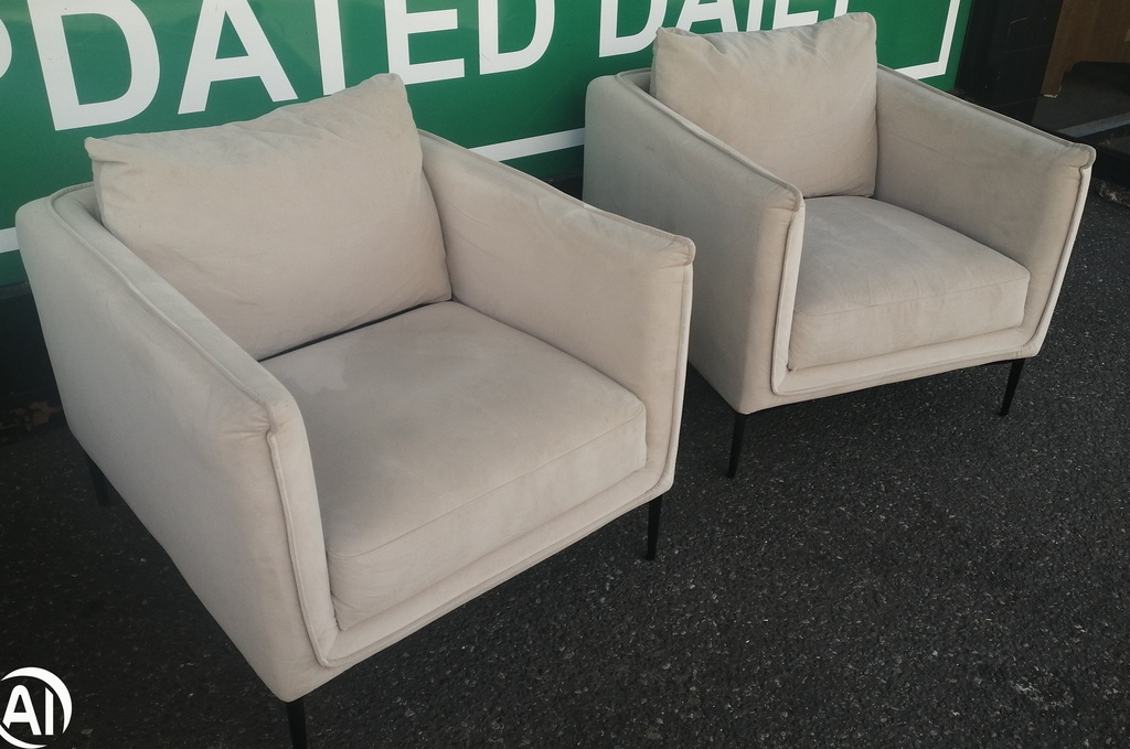 lovely modern designer cream armchairs