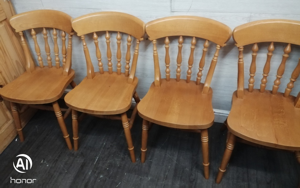 set of four spindle back dining chairs